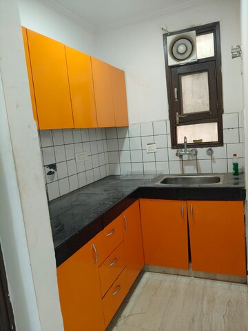 Kitchen in 2 BHK Builder Floor at Freedom Fighters Enclave – for Rent