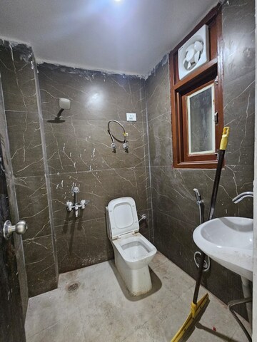Bathroom in 2 BHK Builder Floor at Freedom Fighters Enclave – for Rent