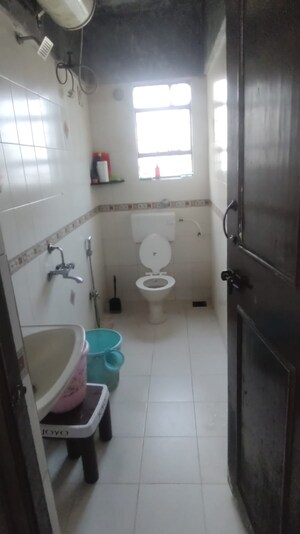 Bathroom in 2 BHK Apartment at Suvarnayug Loksangam Vihar, Aundh – for Rent