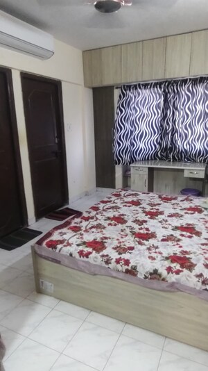 Bedroom in 2 BHK Apartment at Suvarnayug Loksangam Vihar, Aundh – for Rent