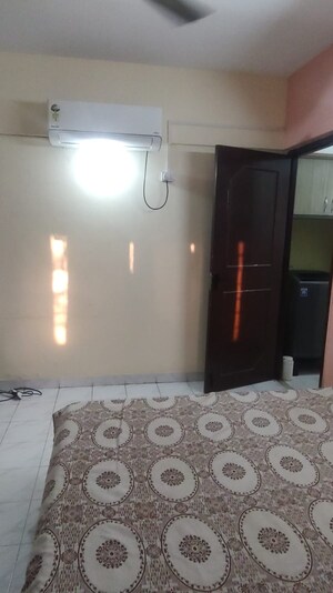 Bedroom in 2 BHK Apartment at Suvarnayug Loksangam Vihar, Aundh – for Rent