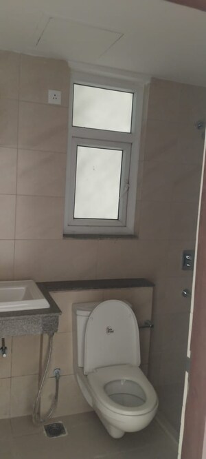 Bathroom in 3 BHK Apartment at Puri Aanandvilas, Sector 81 – for Sale