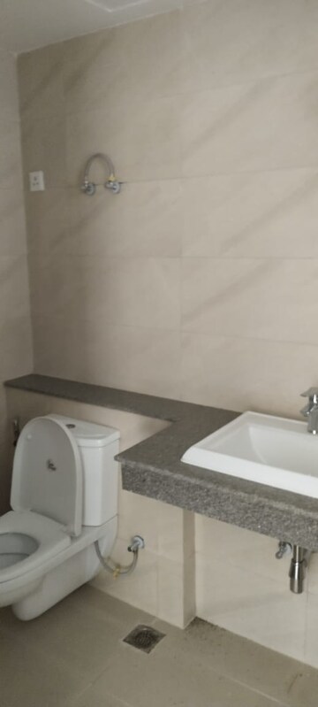 Bathroom in 3 BHK Apartment at Puri Aanandvilas, Sector 81 – for Sale