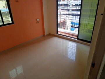 Living Room in 1 BHK Apartment at Vrindavan CHS Kharghar, Kharghar – for Sale