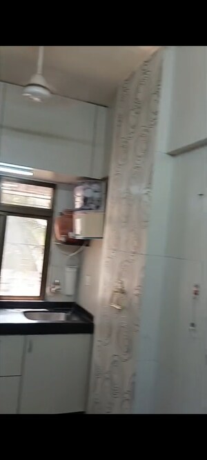 Kitchen in 2 BHK Apartment at Kedarnath Apartment, Vile Parle East – for Rent