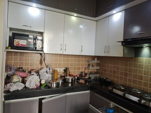 Kitchen in 3 BHK Apartment at Mahagun Mywoods, Sector 16c Greater Noida – for Rent