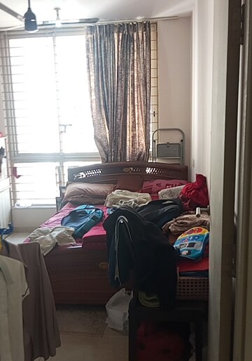 Living Room in 2 BHK Apartment at Rodas Enclave Evergreen, Patlipada – for Sale