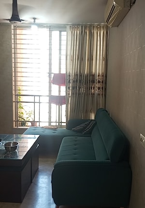 Living Room in 2 BHK Apartment at Rodas Enclave Evergreen, Patlipada – for Sale