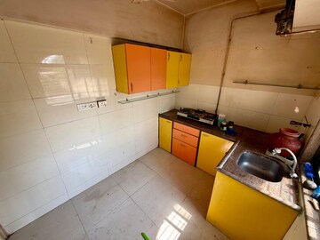 Kitchen in 2 BHK Apartment at Luv Kush Tower, Chembur – for Rent