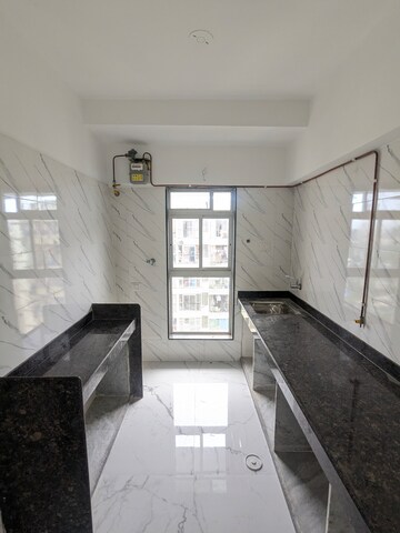 Kitchen in 1 BHK Apartment at Dharti Pressidio, Kandivali West – for Rent