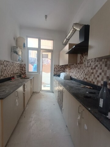 Kitchen in 3 BHK Villa at Amrapali Leisure Valley, Tech Zone 4 Greater Noida – for Rent