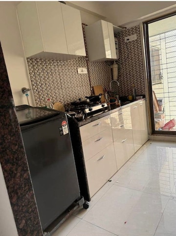 Kitchen in 3 BHK Apartment at New India Grace Luxuria, Malad West – for Rent