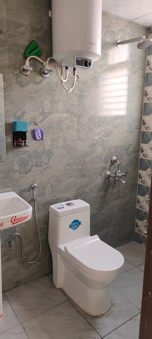 Bathroom in 1 BHK Builder Floor at Dharam Flats, Palam Vihar Extension – for Rent