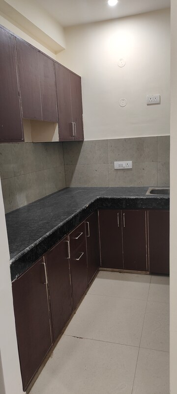 Kitchen in 1 BHK Builder Floor at Dharam Flats, Palam Vihar Extension – for Rent
