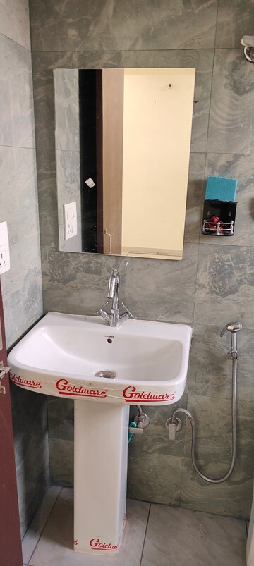 Bathroom in 1 BHK Builder Floor at Dharam Flats, Palam Vihar Extension – for Rent