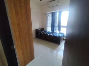 Bedroom in 2 BHK Apartment at Lodha Amara, Kolshet Road – for Rent