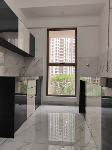 Kitchen in 1 BHK Apartment at Raymond Ten X Habitat, Pokhran Road No Two – for Sale