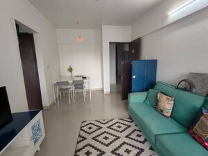 Living Room in 1 BHK Apartment at The Wadhwa Solitaire, Kolshet Road – for Rent