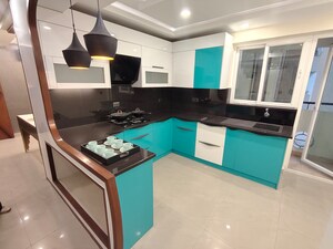 Kitchen in 3 BHK Apartment at Sikka Kaamna Greens, Sector 143a Noida – for Rent