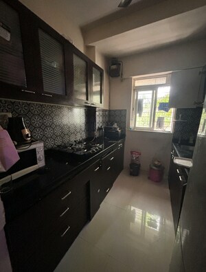 Kitchen in 1 BHK Apartment at Lodha Amara, Kolshet Road – for Rent