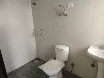 Bathroom in 3 BHK Apartment at Samridhi Luxuriya Avenue, Sector 150 – for Sale