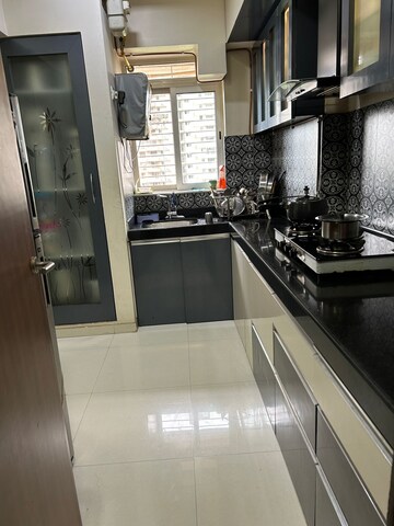 Kitchen in 1.5 BHK Apartment at Lodha Amara, Kolshet Road – for Sale