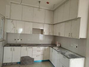 Kitchen in 3 BHK Apartment at Purvanchal Royal City, Chi V Greater Noida – for Sale