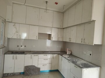 Kitchen in 3 BHK Apartment at Purvanchal Royal City, Chi V Greater Noida – for Sale