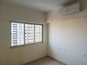 Room in 2 BHK Apartment at Omkar Signet, Malad East – for Rent