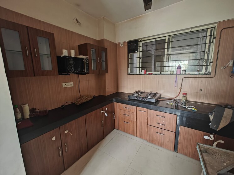Kitchen, nirmiti-lorelle 2 Bedroom 1200 Sq.Ft. Apartment In Wakad Pune 9466853