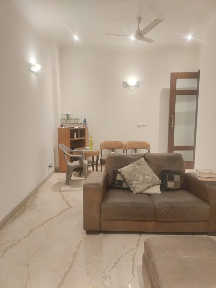 Living Room, gulmohar park 3 Bedroom 200 Sq.Yd. Builder Floor In Gulmohar Park Delhi 9466858