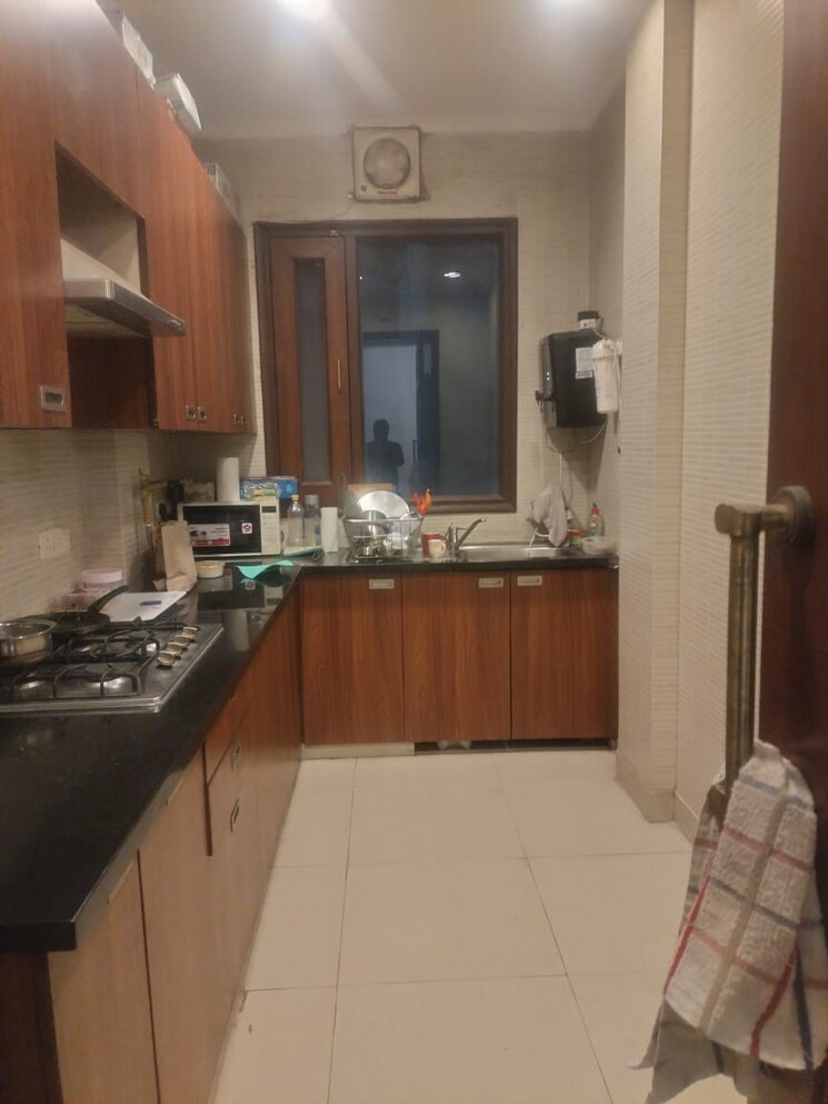 Kitchen, gulmohar park 3 Bedroom 200 Sq.Yd. Builder Floor In Gulmohar Park Delhi 9466858