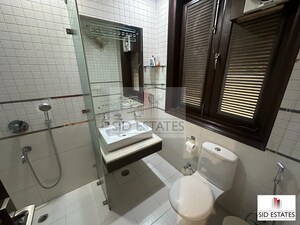 Bathroom in 4 BHK Builder Floor at Anand Lok – for Rent