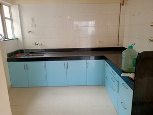 Kitchen in 3 BHK Apartment at Radha Apartments Aundh, Aundh – for Rent
