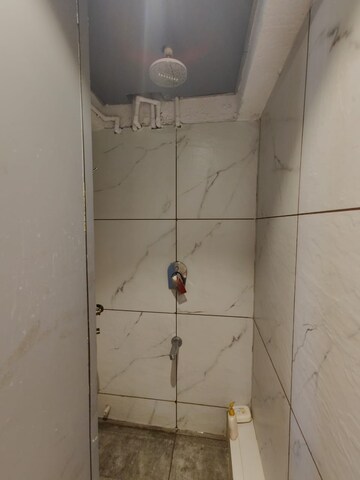 Bathroom in 2 BHK Apartment at Rattan Icon, Seawoods Sector 50 – for Rent