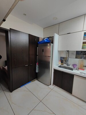 Kitchen in 2 BHK Apartment at Rattan Icon, Seawoods Sector 50 – for Rent
