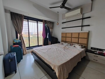 Bedroom in 2 BHK Apartment at Rattan Icon, Seawoods Sector 50 – for Rent