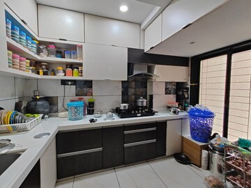 Kitchen in 2 BHK Apartment at Rattan Icon, Seawoods Sector 50 – for Rent