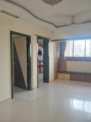 Room in 2 BHK Apartment at Badri Kedar Building, Seawoods Sector 40 – for Rent