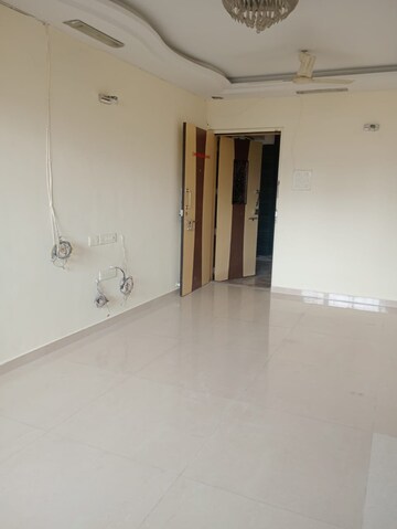 Room in 2 BHK Apartment at Badri Kedar Building, Seawoods Sector 40 – for Rent