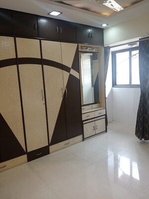 Staircase in 2 BHK Apartment at Badri Kedar Building, Seawoods Sector 40 – for Rent