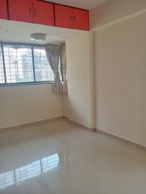 Room in 2 BHK Apartment at Badri Kedar Building, Seawoods Sector 40 – for Rent