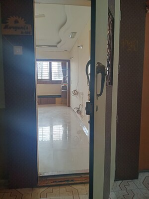 Building Lobby in 2 BHK Apartment at Badri Kedar Building, Seawoods Sector 40 – for Rent