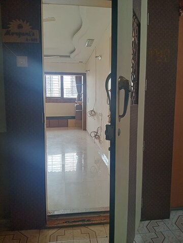Building Lobby in 2 BHK Apartment at Badri Kedar Building, Seawoods Sector 40 – for Rent