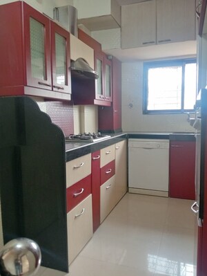 Kitchen in 2 BHK Apartment at Badri Kedar Building, Seawoods Sector 40 – for Rent