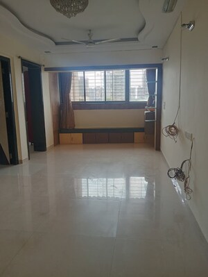 Room in 2 BHK Apartment at Badri Kedar Building, Seawoods Sector 40 – for Rent