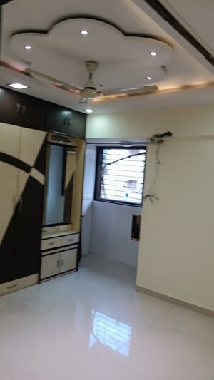 Team Area in 2 BHK Apartment at Badri Kedar Building, Seawoods Sector 40 – for Rent