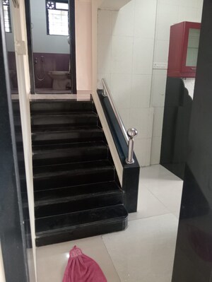 Staircase in 2 BHK Apartment at Badri Kedar Building, Seawoods Sector 40 – for Rent