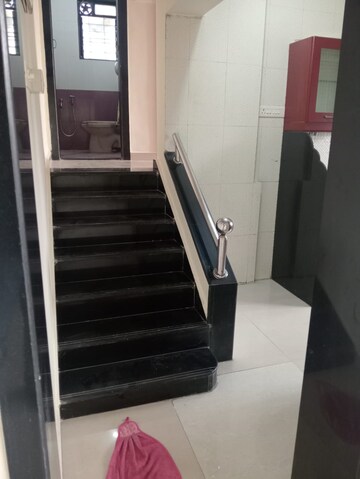 Staircase in 2 BHK Apartment at Badri Kedar Building, Seawoods Sector 40 – for Rent