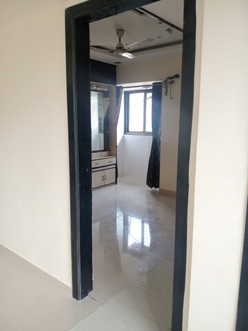 Room in 2 BHK Apartment at Badri Kedar Building, Seawoods Sector 40 – for Rent